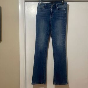 White house  black market mid rise, boot cut jeans size 4